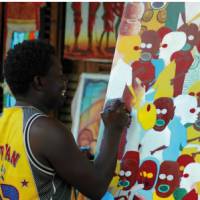 Artist on the colourful streets of Zanzibar | Sue Badyari