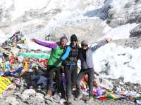 Happy trekkers at Everest Base Camp |  Ayla Rowe